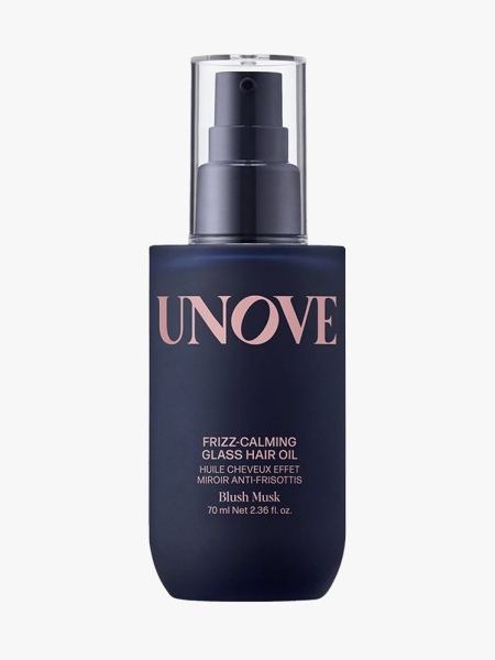 UNOVE Frizz-Calming Glass Hair Oil in Blush Musk in branded component on a light gray background