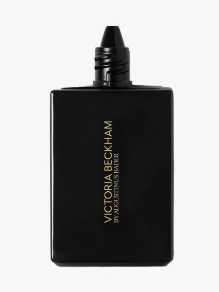 Black bottle of Victoria Beckham Beauty The Foundation Drops on light gray background