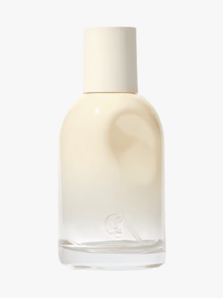 Glossier You Doux in branded bottle component on a light gray background
